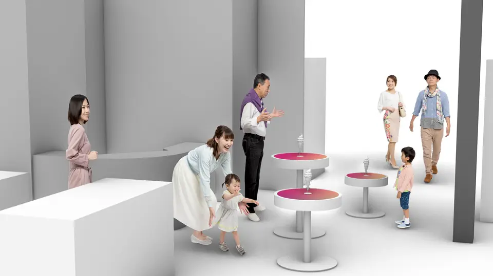 ソフトクリームを置くと特別な演出が始まるテーブル「Magical soft ice」のイメージ。テーブルを囲む来場者たち